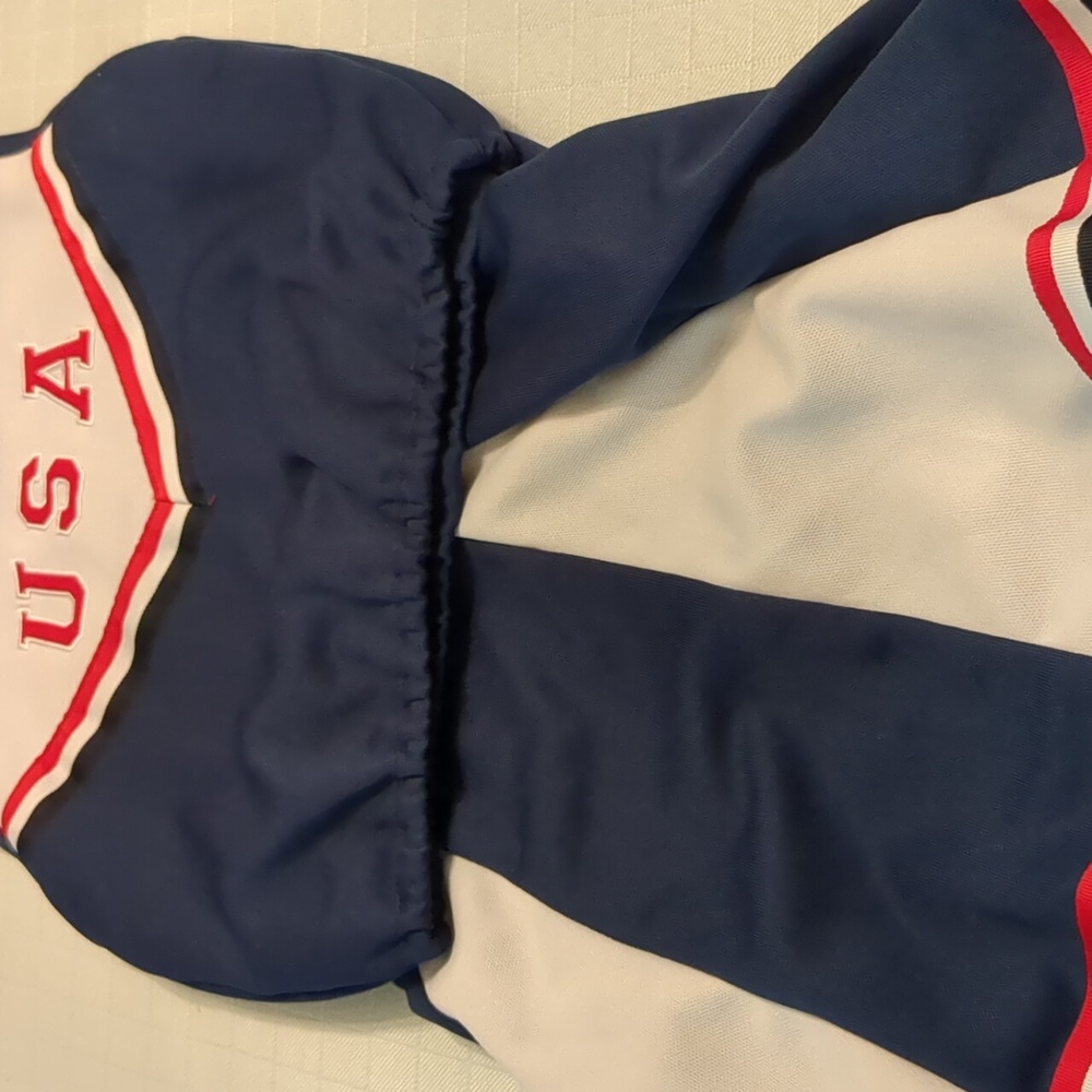 Girls size Medium 2 piece Cheer Leader outfit with pom poms.